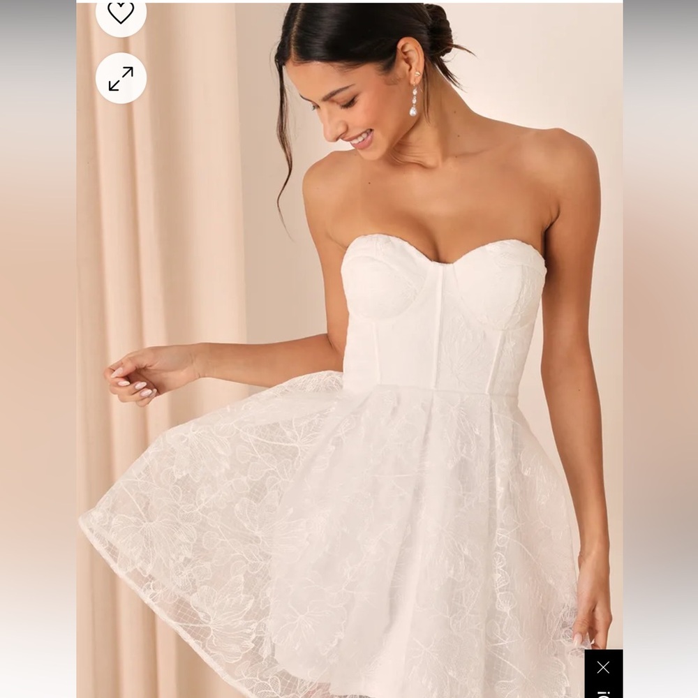 Size Large white dress. Never worn still has tags!